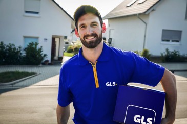 man transporting a parcel on the street 