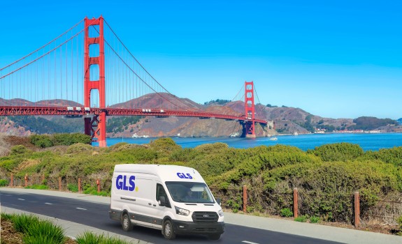 GLS delivery van driving in front of golden gate bridge